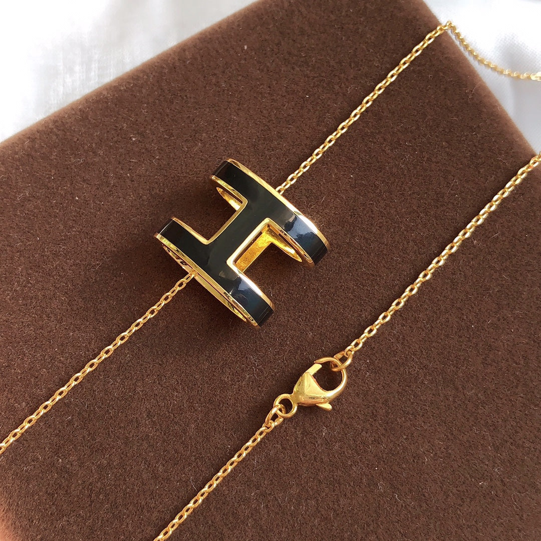 [MIRA]HM CLIC BLACK ENAMEL GOLD NECKLACE