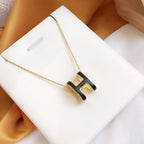 [MIRA]HM CLIC BLACK ENAMEL GOLD NECKLACE