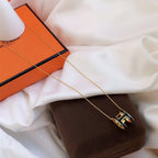 [MIRA]HM CLIC BLACK ENAMEL GOLD NECKLACE